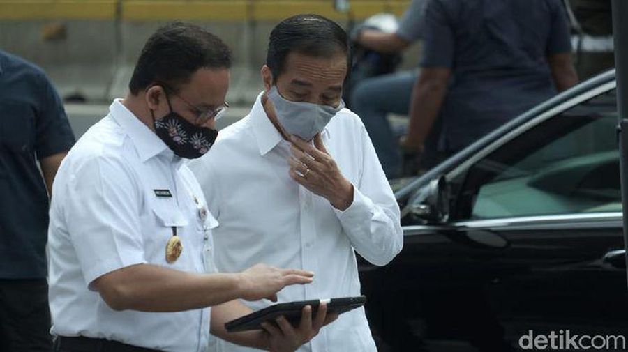 Presiden Jokowi bersama Anies Baswedan. (Andika Prasetia/detikcom).
