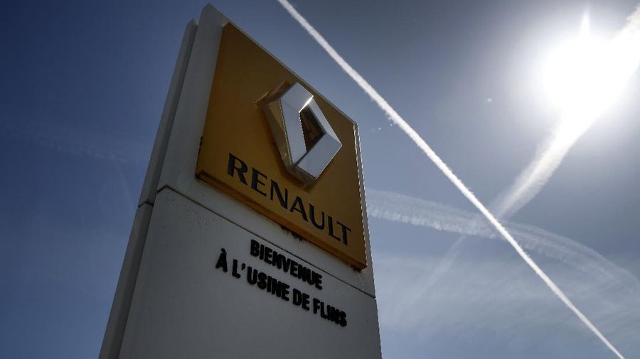 The logo of French carmaker Renault is pictured at the Flins plant of French carmaker Renault in Aubergenville, west of Paris, Monday, May 25, 2020. French President Emmanuel Macron is set to unveil sweeping new measures to rescue France's car industry, hammered by virus lockdown and the resulting recession. The issue is politically sensitive, since France is proud of its auto industry, which employs 400,000 people and is an important part of the country's remaining manufacturing sector. (AP Photo/Christophe Ena)