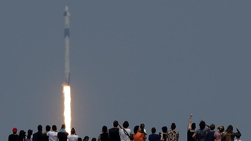 A SpaceX Falcon 9, with NASA astronauts Doug Hurley and Bob Behnken in the Crew Dragon capsule, lifts off from Pad 39-A at the Kennedy Space Center in Cape Canaveral, Fla., Saturday, May 30, 2020. The two astronauts are on the SpaceX test flight to the International Space Station. For the first time in nearly a decade, astronauts blasted towards orbit aboard an American rocket from American soil, a first for a private company. (AP Photo/David J. Phillip)