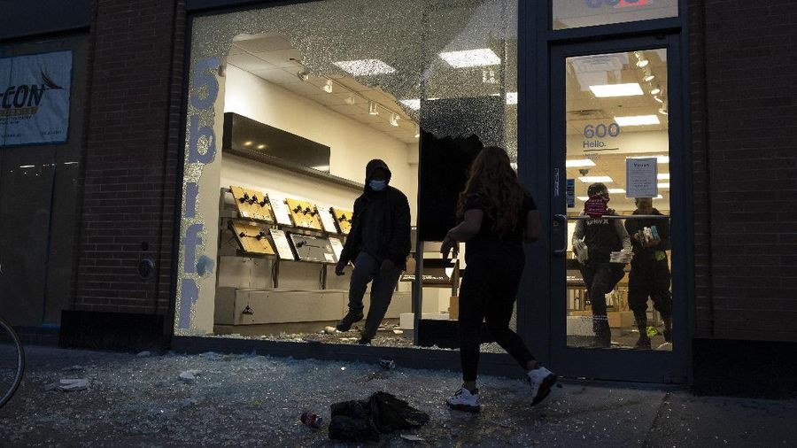 Penjarahan di Amerika Serikat. AP/Seth Wenig