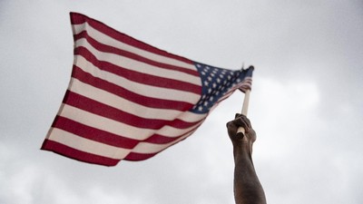 Demonstrators protest Friday, June 5, 2020, near the White House in Washington, over the death of George Floyd, a black man who was in police custody in Minneapolis. Floyd died after being restrained by Minneapolis police officers.. (AP Photo/Carolyn Kaster)