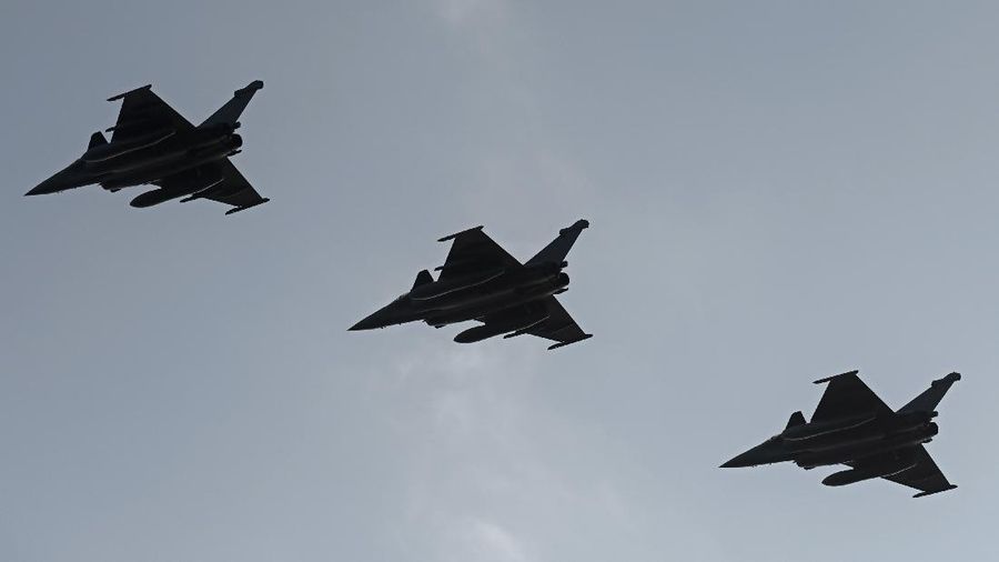 A Rafale fighter jet lands on deck of the French aircraft carrier Charles de Gaulle, off the coast of the city of Hyeyres, southern France, Thursday, Jan. 23, 2020. France deploys the Charles de Gaulle aircraft carrier for a three-month mission to support International military operations in the Middle East, French President Emmanuel Macron said. (Philippe Lopez/Pool Photo via AP)