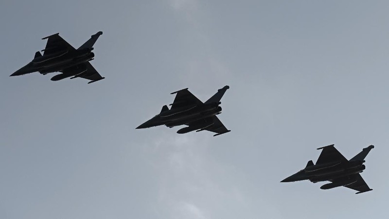A Rafale fighter jet lands on deck of the French aircraft carrier Charles de Gaulle, off the coast of the city of Hyeyres, southern France, Thursday, Jan. 23, 2020. France deploys the Charles de Gaulle aircraft carrier for a three-month mission to support International military operations in the Middle East, French President Emmanuel Macron said. (Philippe Lopez/Pool Photo via AP)