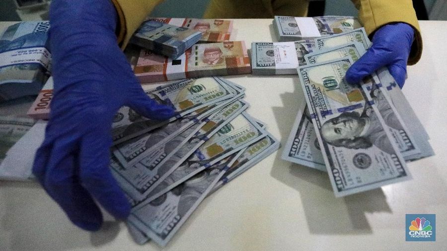 Ilustrasi Rupiah dan dolar (վ/Andrean Kristianto)