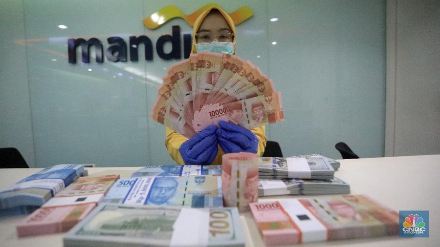 Ilustrasi Rupiah dan dolar (CNBC Indonesia/Andrean Kristianto)