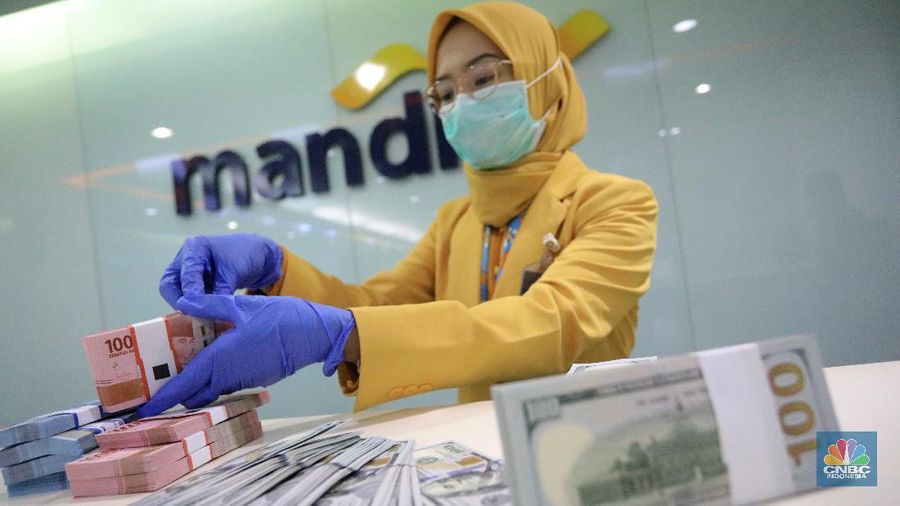 Ilustrasi Rupiah dan dolar (CNBC Indonesia/Andrean Kristianto)