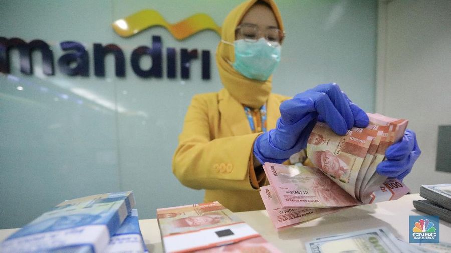 Ilustrasi Rupiah dan dolar (CNBC Indonesia/Andrean Kristianto)