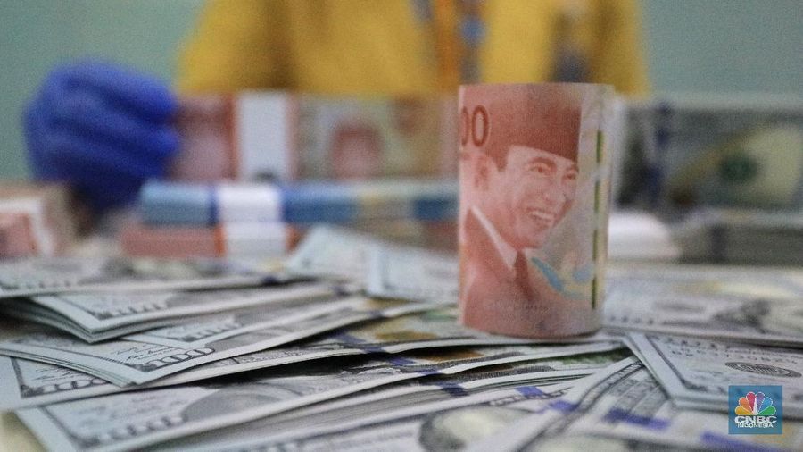 Ilustrasi Rupiah dan dolar (վ/Andrean Kristianto)