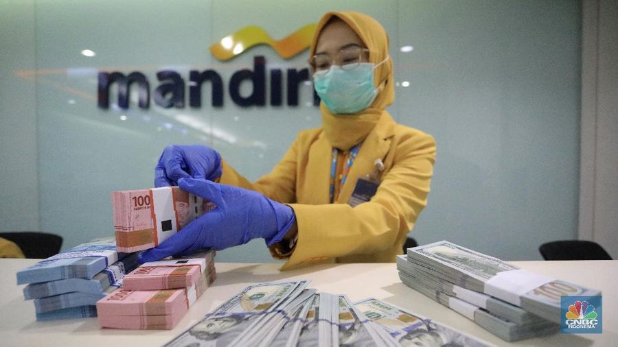 Ilustrasi Rupiah dan dolar (CNBC Indonesia/Andrean Kristianto)