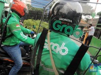 Masih Rajin Bakar Duit, Grab Bukukan Kerugian Rp 8,3 T