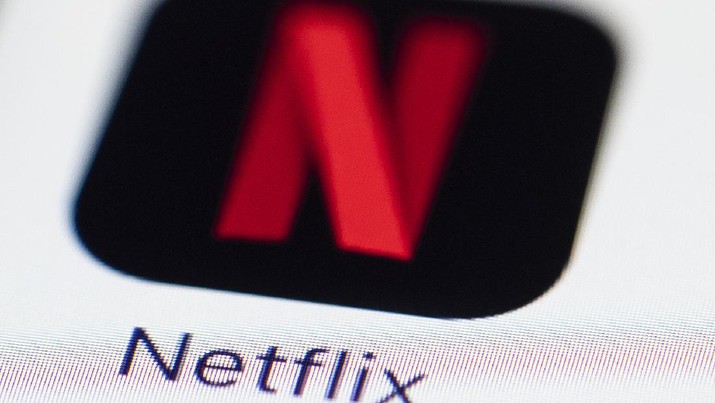 This July 17, 2017, photo shows a Netflix logo on an iPhone in Philadelphia. (AP Photo/Matt Rourke)