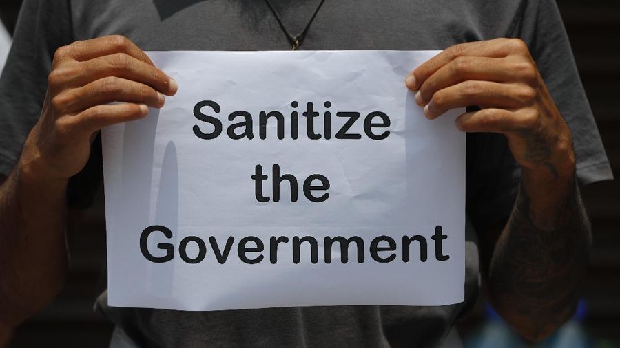 Nepalese police use water cannon to disperse youth who gathered for a protest near prime minister's residence demanding better handling of the COVID-19 pandemic in Kathmandu, Nepal, Thursday, June 11, 2020. About 1000 protesters had gathered demanding increased testing and alleging corruption by government officials while purchasing equipment and testing kits. (AP Photo/Niranjan Shrestha)