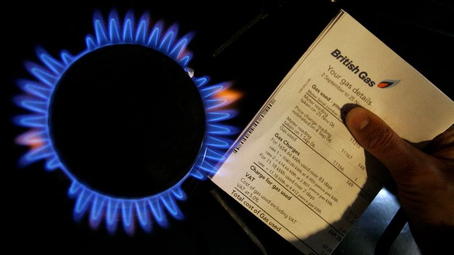A British Gas bill is displayed by a gas ring on a cooker in this photo illustration in London, Thursday, Feb. 21, 2008. British Gas has reported annual profits of 571m, up from 95m in 2006. Centrica, British Gas' parent company, reported a 40% rise in operating profits to 1.95bn (AP Photo/Kirsty Wigglesworth)
