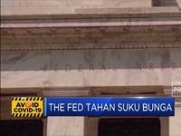 The Fed Tahan Suku Bunga