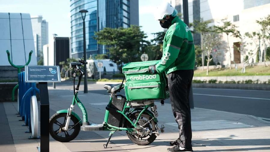 Mitra Pengantaran GrabFood dengan Sepeda Listrik (Dok. Grab)