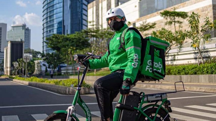 Mitra Pengantaran GrabFood dengan Sepeda Listrik (Dok. Grab)