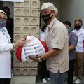 Menaker Serahkan 223.213 Bansos Presiden ke Serikat Pekerja