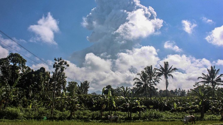 Mount Merapi spews volcanic materials during an eruption as seen from Sleman, Indonesia, Sunday, June 21, 2020. The country's most volatile volcano on Sunday spewed ash and hot gas in a massive column as high as 6 kilometers (3.7 miles) into the sky. Indonesia, an archipelago of 270 million people, is prone to earthquakes and volcanic activity because it sits along the Pacific 
