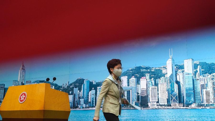 Hong Kong Chief Executive Carrie Lam left after a press conference in Hong Kong, Tuesday, June 30, 2020. Hong Kong media are reporting that China has approved a contentious law that would allow authorities to crack down on subversive and secessionist activity in Hong Kong, sparking fears that it would be used to curb opposition voices in the semi-autonomous territory.(AP Photo/Vincent Yu)