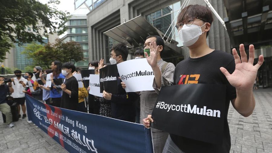 Supporters of Hong Kong protesters stage a rally calling for a boycott of the Disney-produced film 