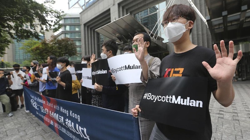 Supporters of Hong Kong protesters stage a rally calling for a boycott of the Disney-produced film 