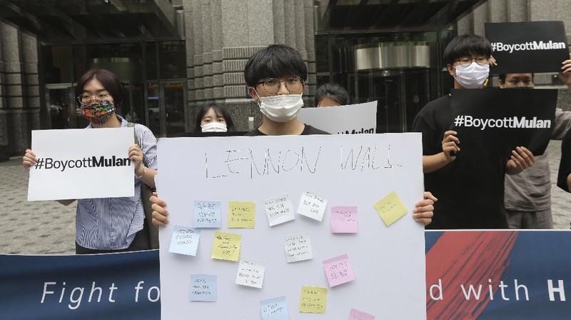 Supporters of Hong Kong protesters stage a rally calling for a boycott of the Disney-produced film 