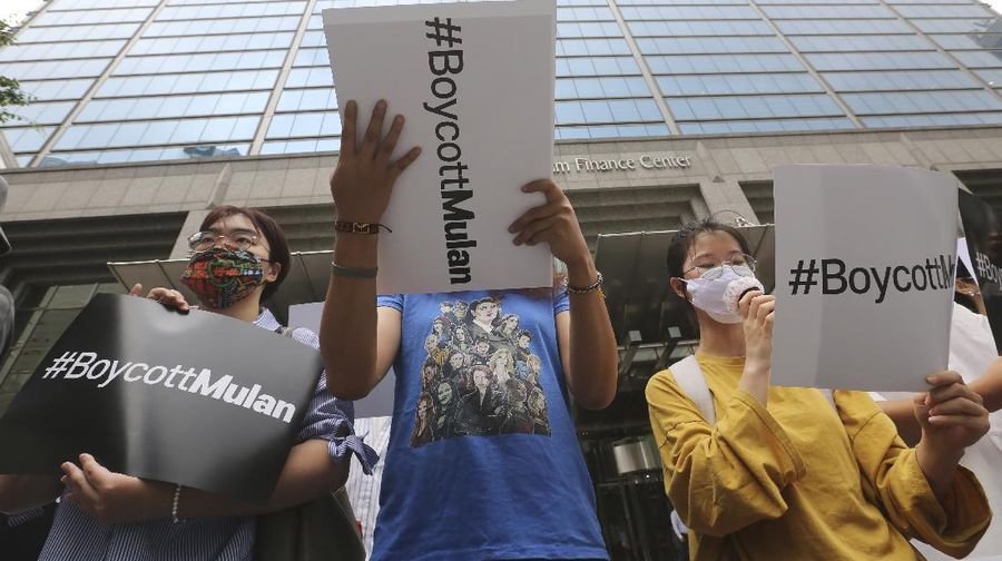 Supporters of Hong Kong protesters stage a rally calling for a boycott of the Disney-produced film 