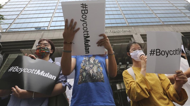 Supporters of Hong Kong protesters stage a rally calling for a boycott of the Disney-produced film 