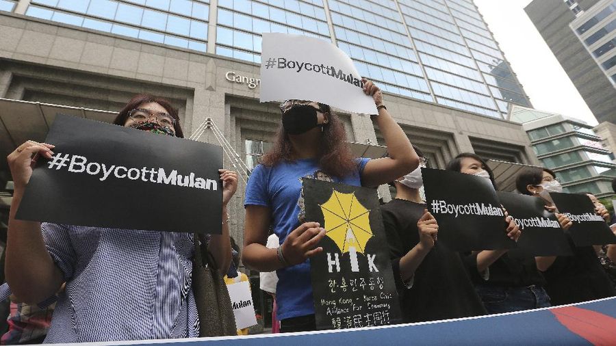 Supporters of Hong Kong protesters stage a rally calling for a boycott of the Disney-produced film 
