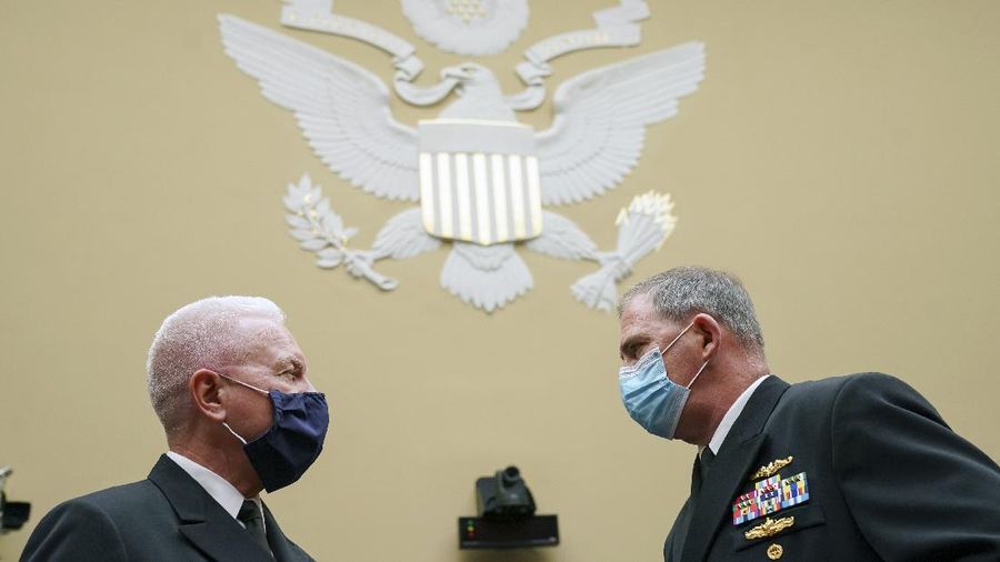 House Minority Whip Rep. Steve Scalise, R-La., left, talks with Pentagon Supply Chain Stabilization Task Force Vice Director of Logistics Rear Admiral John Polowczyk, center, and Assistant Secretary for Health Admiral Brett P. Giroir, right, before a House Select Subcommittee on the Coronavirus Crisis hearing on the response