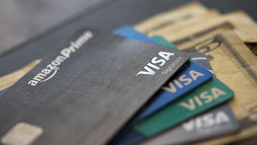 This Aug. 11, 2019 file photo shows credit cards in New Orleans. U.S. consumer borrowing plunged in April as households fretted about the disruptions caused by the coronavirus pandemic and cut back on their use of credit. The Federal Reserve reported Friday, June 5, 2020 that total borrowing fell by $68.8 billion, or 19.6%. That was the biggest one-month decline in percentage terms since the end of World War II. (AP Photo/Jenny Kane, file)