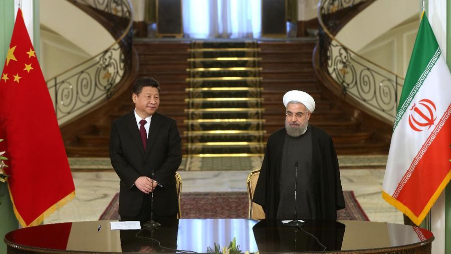 Iranian President Hassan Rouhani, right, speaks with media in a joint press conference with his Chinese counterpart Xi Jinping after their meeting at the Saadabad Palace in Tehran, Iran, Saturday, Jan. 23, 2016. Chinese President Xi Jinping, visiting Iran just days after the lifting of international sanctions under a historic nuclear deal, said he hopes for a 