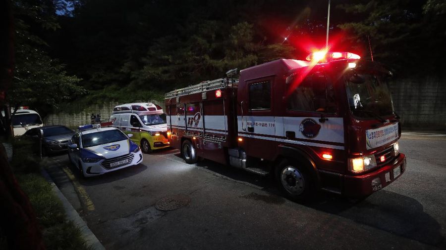 Rescuers arrive to search for missing Seoul Mayor Park Won-soon in Seoul, South Korea, Thursday, July 9, 2020. Police say Park has been reported missing and search operations are underway. (Lee Young-hwan/Newsis via AP)