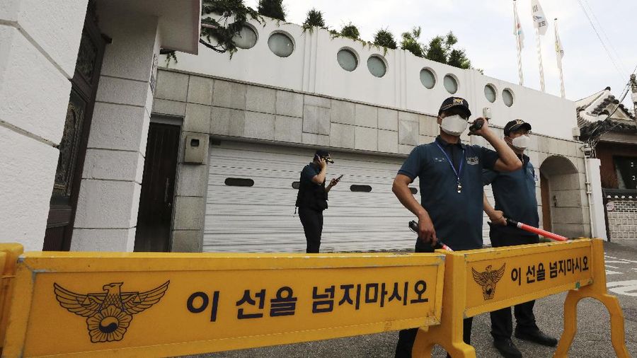 Rescuers arrive to search for missing Seoul Mayor Park Won-soon in Seoul, South Korea, Thursday, July 9, 2020. Police say Park has been reported missing and search operations are underway. (Lee Young-hwan/Newsis via AP)