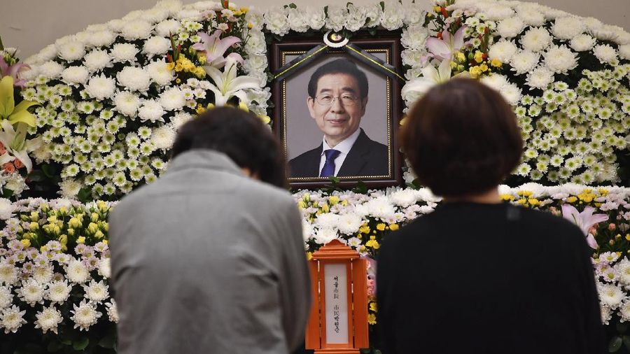 In this photo provided by Seoul Metropolitan Government, a portrait of the deceased Seoul Mayor Park Won-soon is placed at a hospital in Seoul, South Korea, Friday, July 10, 2020. Park left a note saying he felt “sorry to all people” before he was found dead early Friday, officials in the South Korean capital said as people began mourning the liberal legal activist seen as a potential presidential candidate. (Seoul Metropolitan Government via AP)
