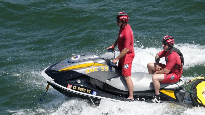 Members of Ventura County Sheriff's Office Underwater Search and Rescue Team search for former 