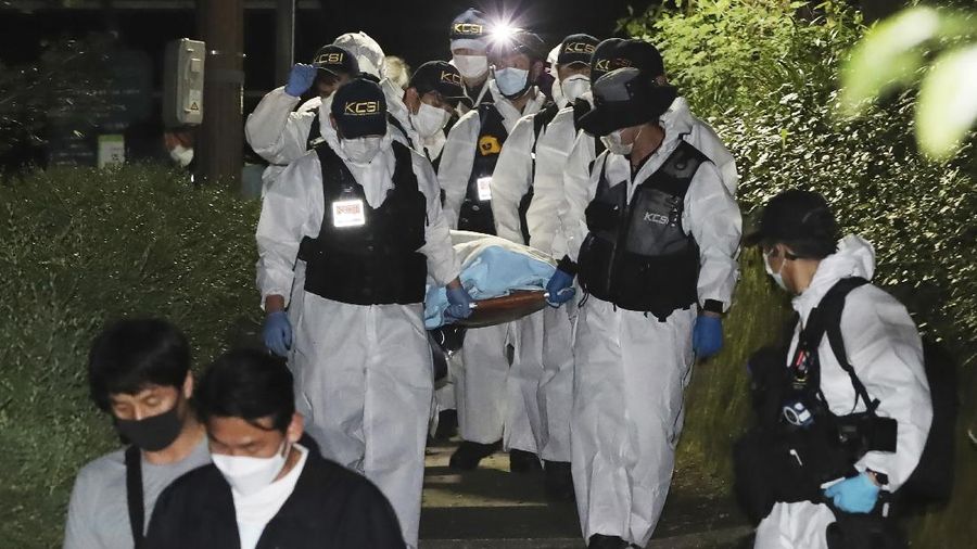 Rescuers arrive to search for missing Seoul Mayor Park Won-soon in Seoul, South Korea, Thursday, July 9, 2020. Police say Park has been reported missing and search operations are underway. (Lee Young-hwan/Newsis via AP)