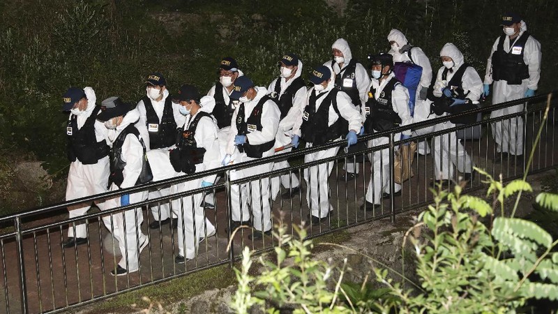 Rescuers arrive to search for missing Seoul Mayor Park Won-soon in Seoul, South Korea, Thursday, July 9, 2020. Police say Park has been reported missing and search operations are underway. (Lee Young-hwan/Newsis via AP)