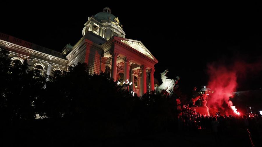 Protesters hold an icon during a protest in front of Serbian Parliament building in Belgrade, Serbia, Friday, July 10 2020. Serbia's President Aleksandar Vucic said Friday he's not worried about losing political power amid large protests against his handling of the coronavirus crisis and hard-line rule, but instead expressed his fear about the spread of the virus by the demonstrators. The spontaneous protests started on Tuesday when Vucic announced that Belgrade would be placed under a new three-day lockdown following a second wave of confirmed coronavirus infections. (AP Photo/Darko Vojinovic)