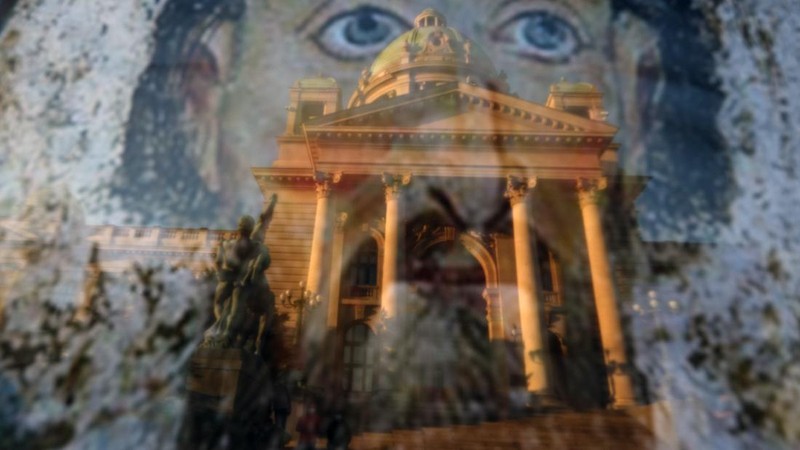 Protesters hold an icon during a protest in front of Serbian Parliament building in Belgrade, Serbia, Friday, July 10 2020. Serbia's President Aleksandar Vucic said Friday he's not worried about losing political power amid large protests against his handling of the coronavirus crisis and hard-line rule, but instead expressed his fear about the spread of the virus by the demonstrators. The spontaneous protests started on Tuesday when Vucic announced that Belgrade would be placed under a new three-day lockdown following a second wave of confirmed coronavirus infections. (AP Photo/Darko Vojinovic)
