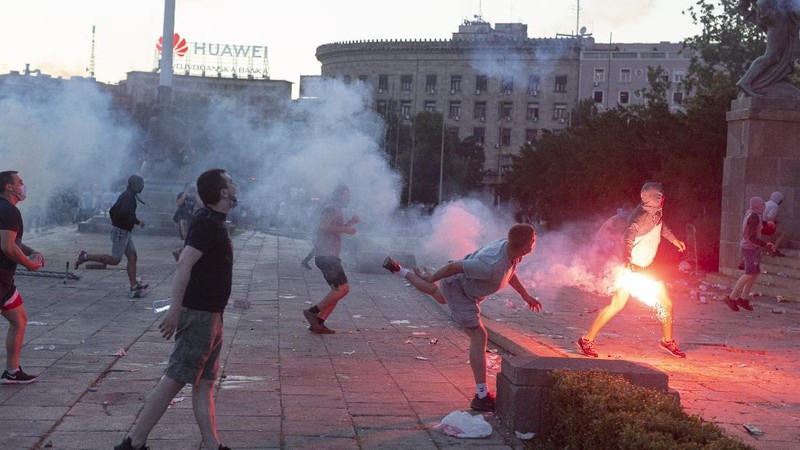 Protesters hold an icon during a protest in front of Serbian Parliament building in Belgrade, Serbia, Friday, July 10 2020. Serbia's President Aleksandar Vucic said Friday he's not worried about losing political power amid large protests against his handling of the coronavirus crisis and hard-line rule, but instead expressed his fear about the spread of the virus by the demonstrators. The spontaneous protests started on Tuesday when Vucic announced that Belgrade would be placed under a new three-day lockdown following a second wave of confirmed coronavirus infections. (AP Photo/Darko Vojinovic)