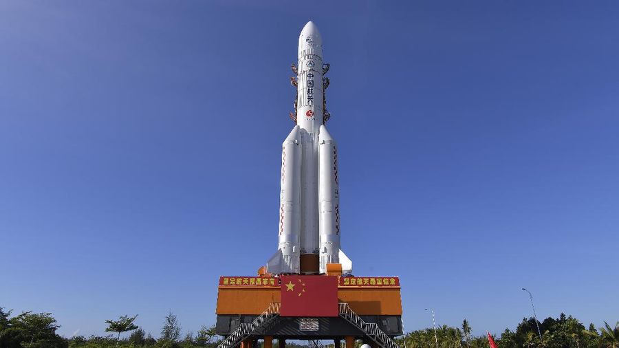 In this photo released by China's Xinhua News Agency, a Long March-5 rocket is seen at the Wenchang Space Launch Center in south China's Hainan Province, Friday, July 17, 2020. China has moved a rocket into position to launch a rover to Mars in one of three upcoming missions to the red planet, one from the U.S. and another by the United Arab Emirates. (Zhang Gaoxiang/Xinhua via AP)