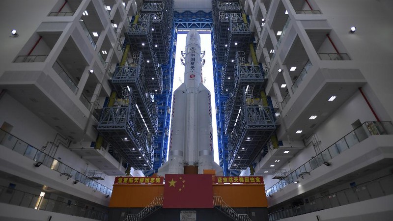 In this photo released by China's Xinhua News Agency, a Long March-5 rocket is seen at the Wenchang Space Launch Center in south China's Hainan Province, Friday, July 17, 2020. China has moved a rocket into position to launch a rover to Mars in one of three upcoming missions to the red planet, one from the U.S. and another by the United Arab Emirates. (Zhang Gaoxiang/Xinhua via AP)