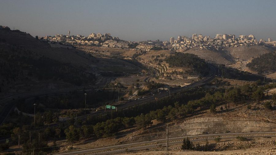 FILE - This June 29, 2020, file photo shows the Israeli settlement of Maale Adumim, in the West Bank. Peter Beinart, an influential American commentator, has shocked the Jewish establishment and Washington policy-making circles by breaking a long-standing taboo: He has endorsed the idea of a democratic entity of Jews and Palestinians living with equal rights between the Jordan River and the Mediterranean.  (AP Photo/Sebastian Scheiner, File)