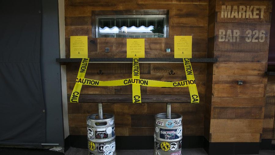 A telescope is seen wrapped in plastic to prevent the spread of COVID-19 at the Griffith Observatory overlooking downtown Los Angeles, Wednesday, July 15, 2020. Coronavirus cases have surged to record levels in the Los Angeles area, putting the nation's largest county in 