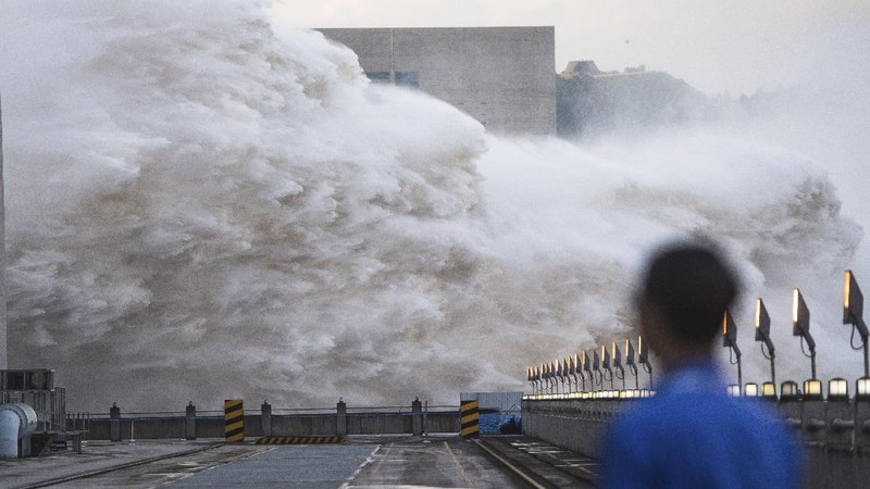 In this photo released by Xinhua News Agency, an aerial photo shows the extent of flooding in Guzhen Town of Lu'an City in eastern China's Anhui Province on Monday, July 20, 2020. (Tang Yang/Xinhua via AP)