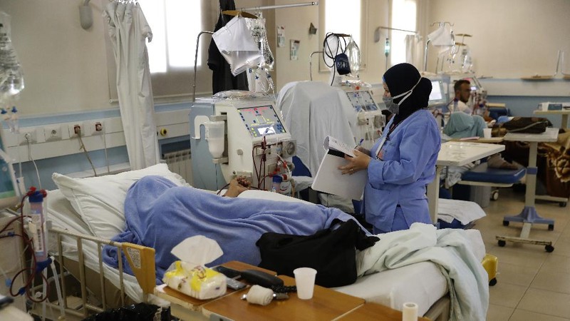 Nurses work at the neonatal intensive care unit, at Family Medical Center, a private hospital facing financial difficulties, in Majdalaiya village, north Lebanon, Thursday, July 16, 2020. Just as Lebanon faces a surge in coronavirus cases, hospitals are cracking under the country's financial crisis. They are struggling to pay staff, keep equipment running or even stay open amid shortages in key supplies like anesthesia and sutures. The health sector has long been one of the best in the Middle East, with its private hospitals drawing patients from around the region. But with dollars in short supply and the state unable to pay insurance bills, hospitals are having to turn away patients and close wards to cut costs. Public facilities, on the front line of the coronavirus fight, are too underfunded and understaffed to fill the gap. (AP Photo/Hussein Malla)
