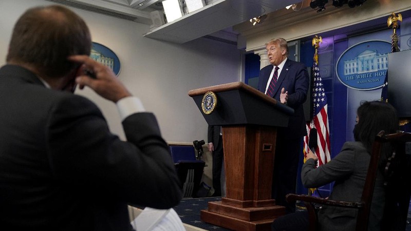 President Donald Trump arrives for a news conference at the White House, Tuesday, July 21, 2020, in Washington. (AP Photo/Evan Vucci)