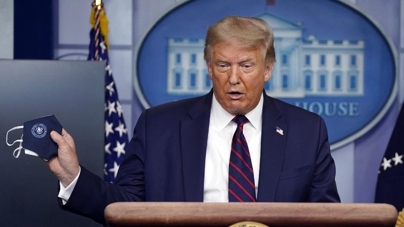 President Donald Trump arrives for a news conference at the White House, Tuesday, July 21, 2020, in Washington. (AP Photo/Evan Vucci)