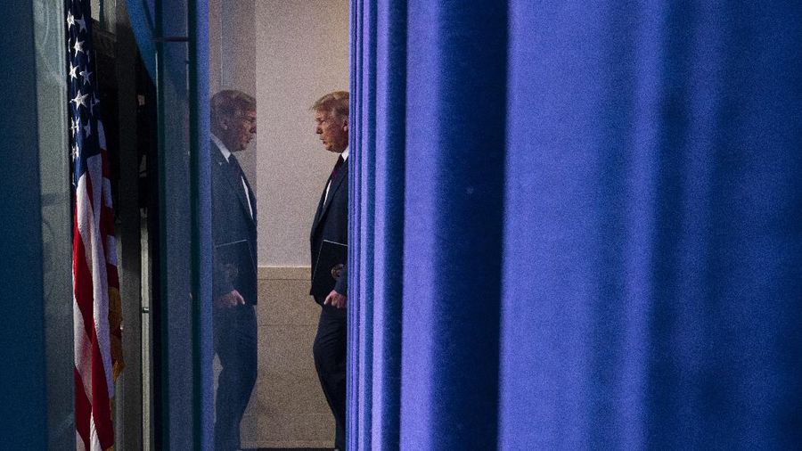 President Donald Trump arrives for a news conference at the White House, Tuesday, July 21, 2020, in Washington. (AP Photo/Evan Vucci)